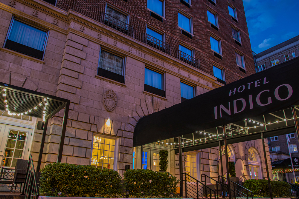 A night time shot of the covered canopy of the historic Indigo Hotel in Atlanta, Georgia