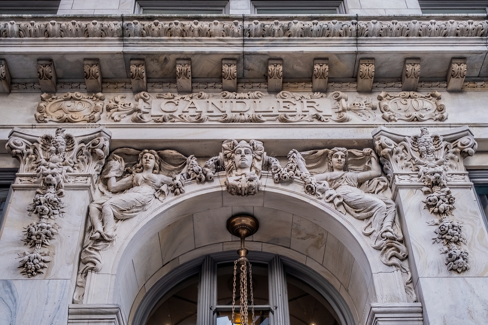 An ornately sculpted arch over a door at the historic Candler Building in Atlanta, Georgia